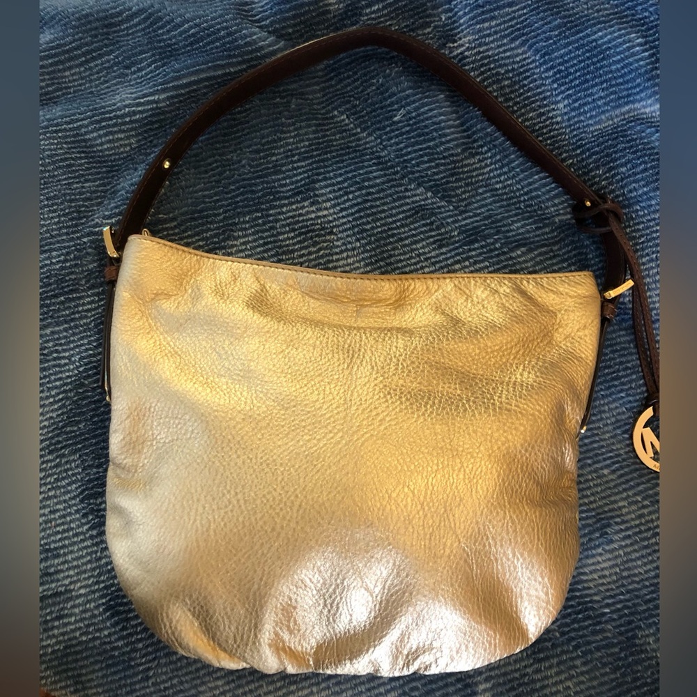 Michael Kors gold handbag